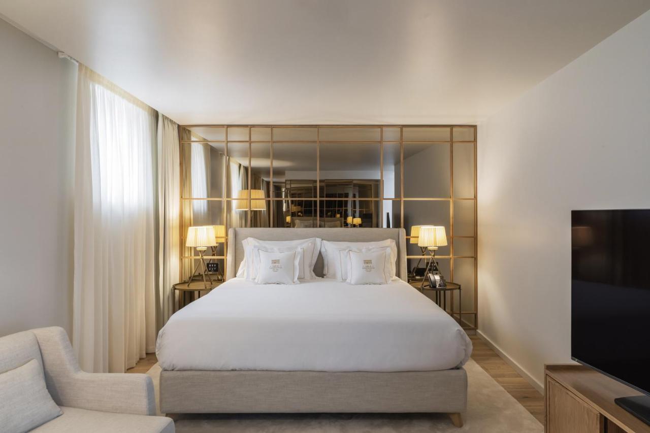 Casa Da Companhia, Vignette Collection By Ihg Hotel Porto Exterior foto A bedroom at the hotel
